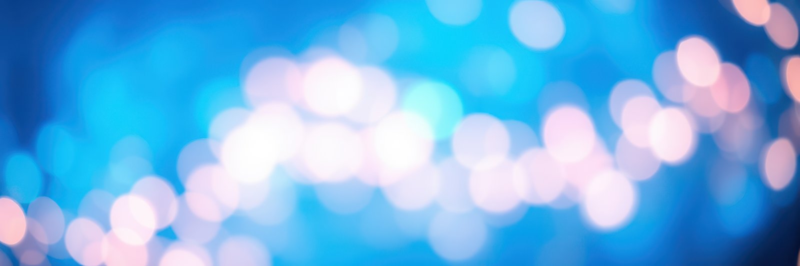 Bright bokeh lights create a dreamy atmosphere for a festive celebration at night